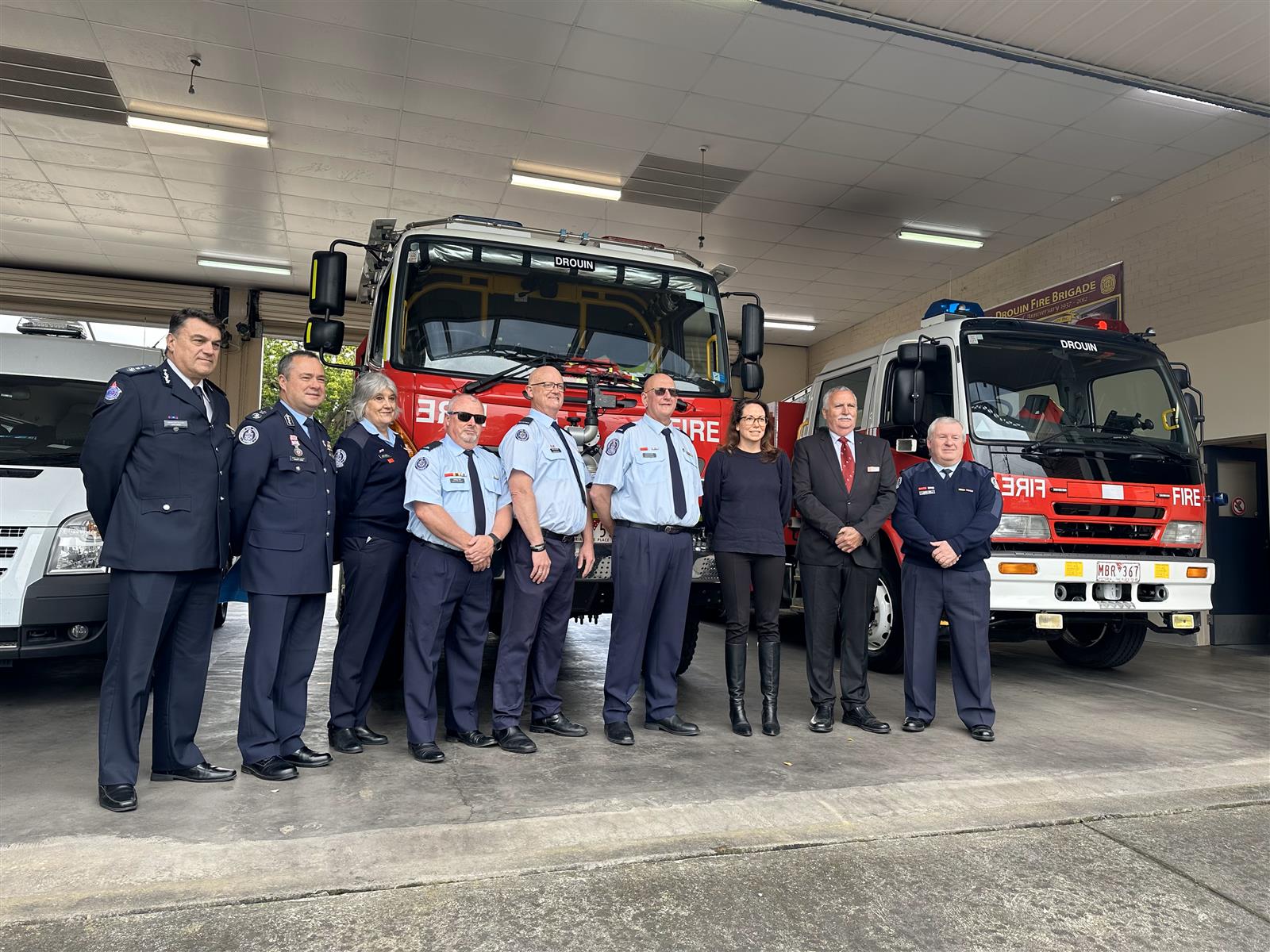 From L-R:  ACFO John Jugam, DCO Trevor Owen, Drouin brigade members Judy Brown, Darren Fox, Mark Dryden, Captain Peter Buur, Minister Jaclyn Symes, CFA Board member Peter Shaw, Mark Fox