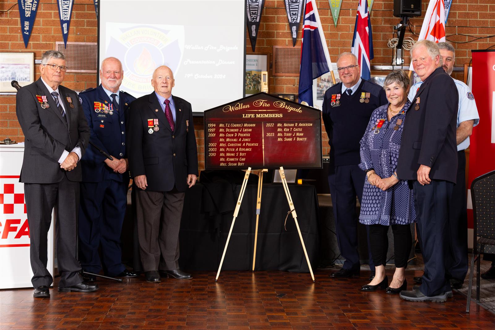 The brigade unveiled a new Brigade Life Members Honour Board. Pictured (L-R) are Colin Prentice, Ex-Capt. Peter Roylance, Ex-Capt. Michael Jones, Shane Benetti, Susan Bott, Wayne Bott and Ex-Capt. Nathan Anderson.