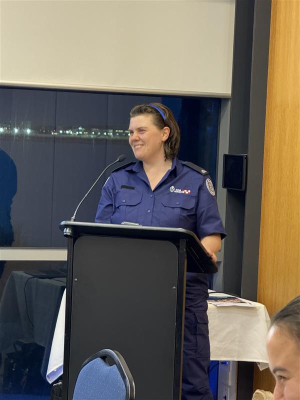 Adele Hunter presents her acknowledgement to the group