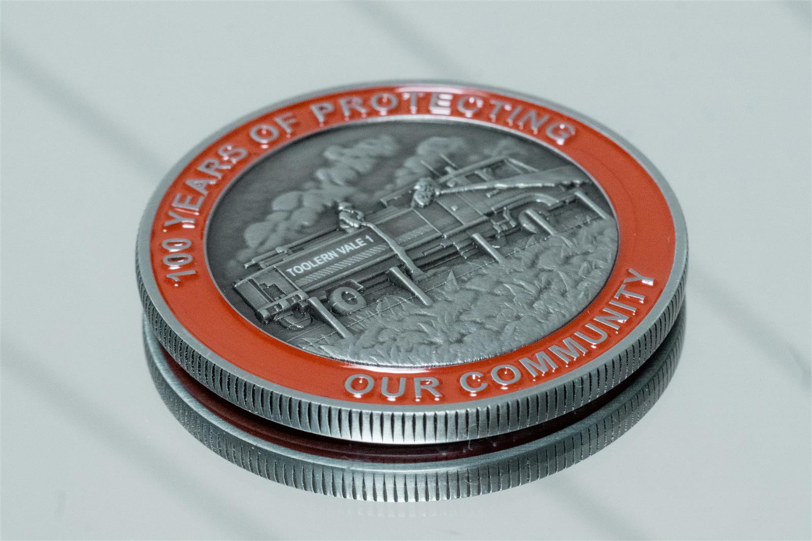 Medallions presented to attendees of the celebration dinner