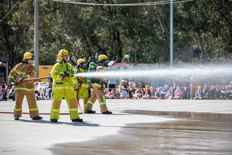 Volunteers exhibited their firefighting skills in front of onlookers on Saturday 5 October. Pictures by Marc Bongers