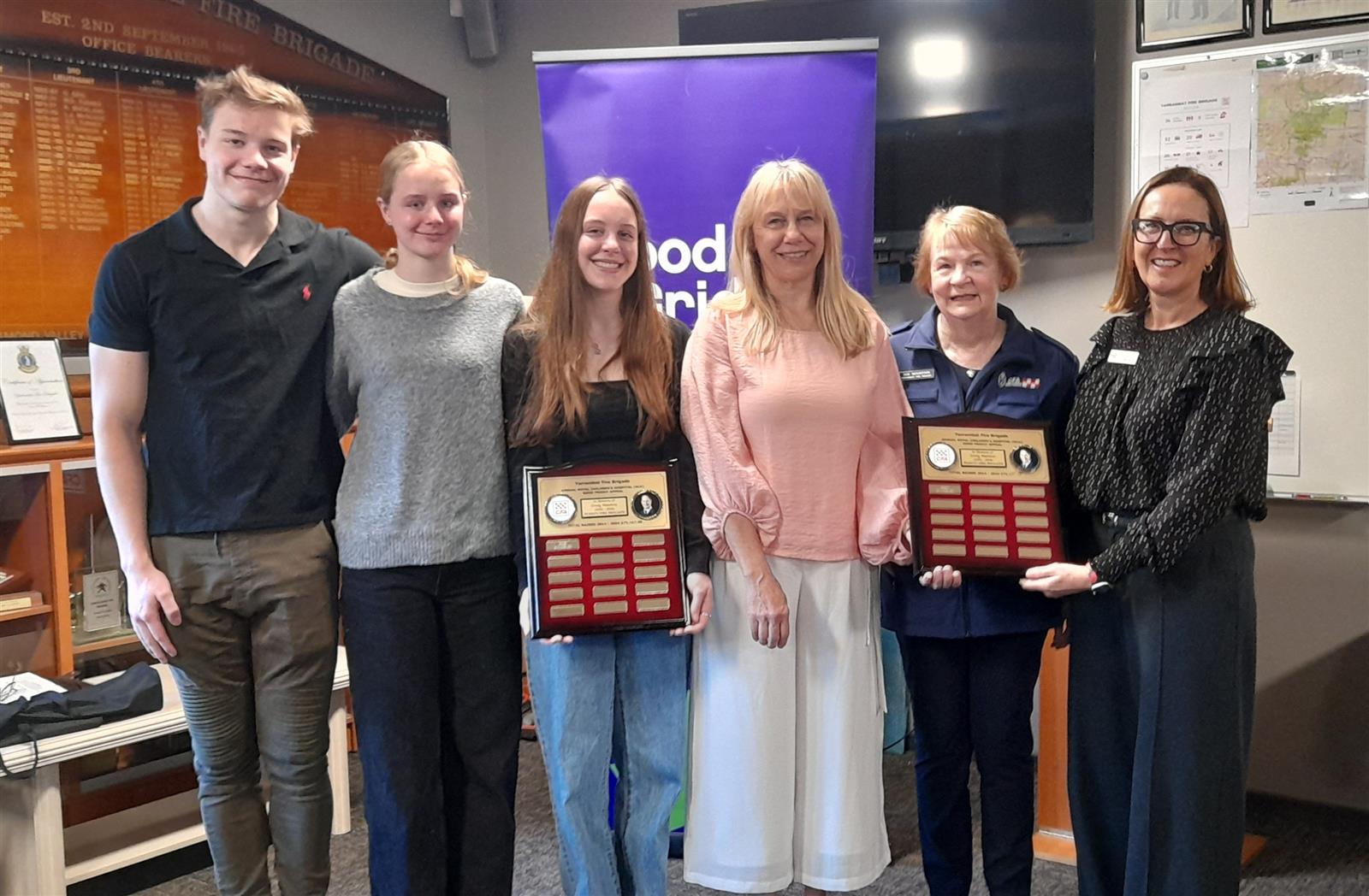 Will, Matilda, Alannah and Karen Wanless, Yarrambat Fire Brigade's Sue Mountain and Good Friday Appeal’s Claire O’Riordan.