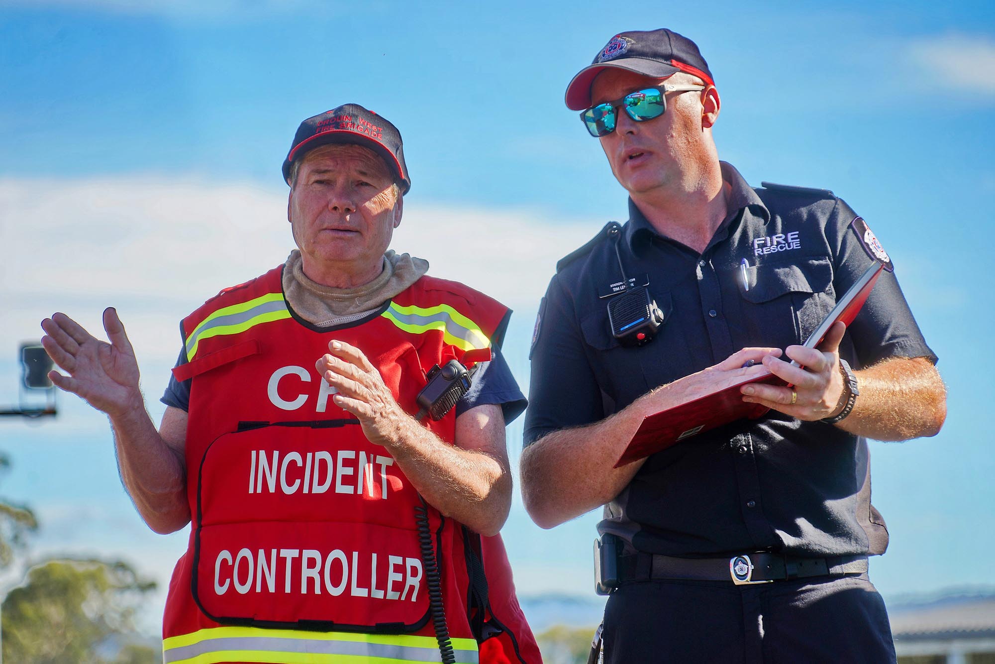 Image of two men talking