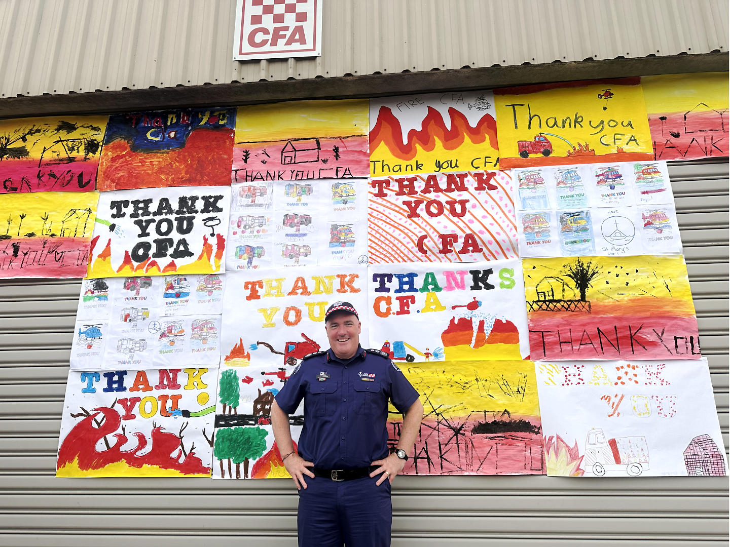 Jason with thank you signs